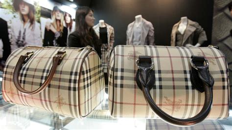 Burberry has lost a crucial ruling on its signature tan, black and 